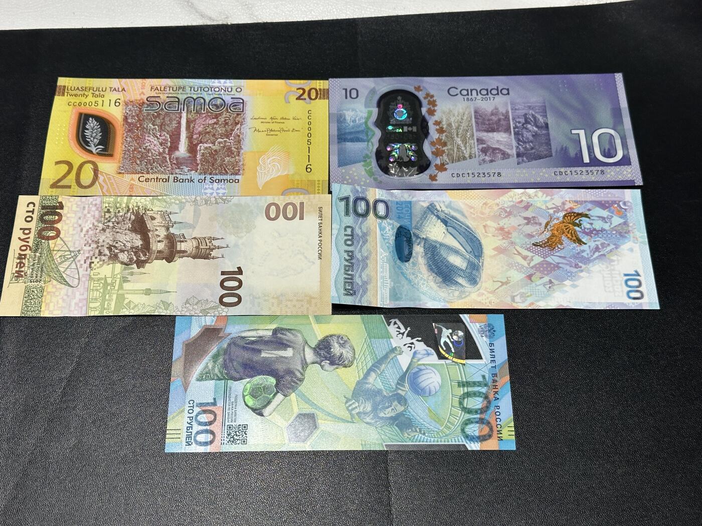 《外钞收藏家》第五百九十七期（年底收官场）（本平台长期征集拍品、欢迎藏友们联系合作） 萨摩亚20无47千位号+加拿大10元+三张100卢布 一起 全新UNC