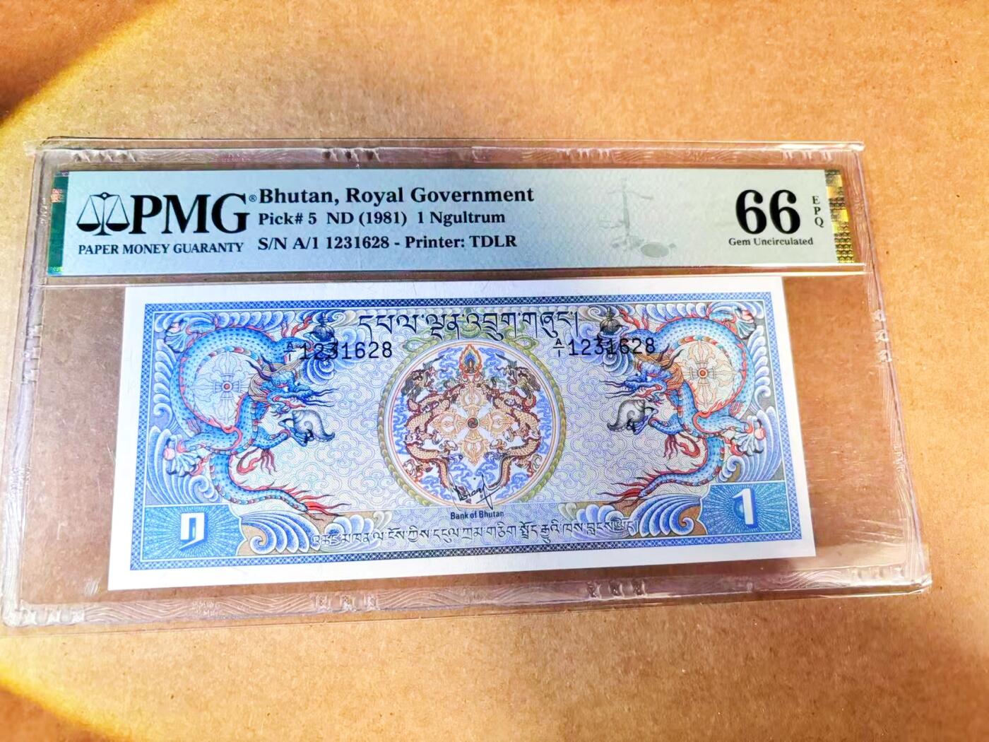 【Blue Auction】世界纸币精拍第768期——18级TOP拍卖/信誉/品质/专业/高效💫 【A/1首发冠 无47】不丹 1981年1努尔特鲁姆 PMG66EPQ 