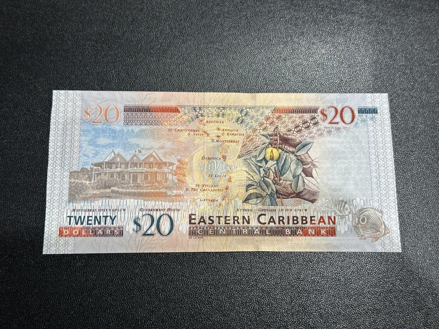 《外钞收藏家》第五百九十七期（年底收官场）（本平台长期征集拍品、欢迎藏友们联系合作） 东加勒比女王钞20元 全新UNC