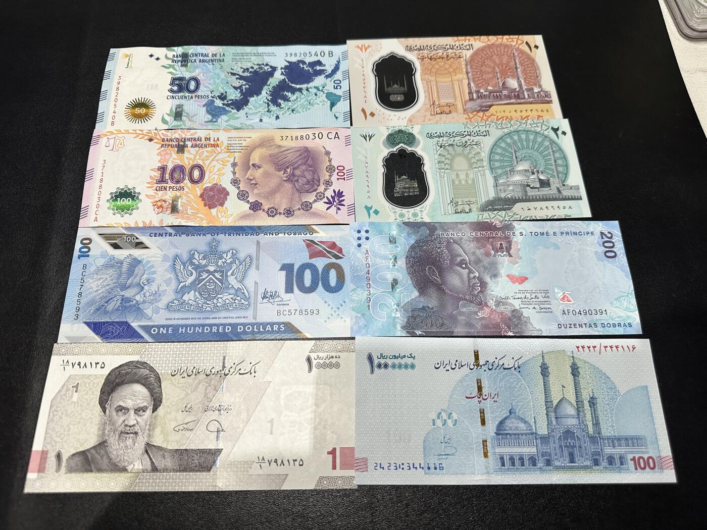 《外钞收藏家》第五百九十七期（年底收官场）（本平台长期征集拍品、欢迎藏友们联系合作） 阿根廷、埃及、特里达尼亚和多巴哥、圣多美和普林西比、伊朗 8张一起 全新UNC