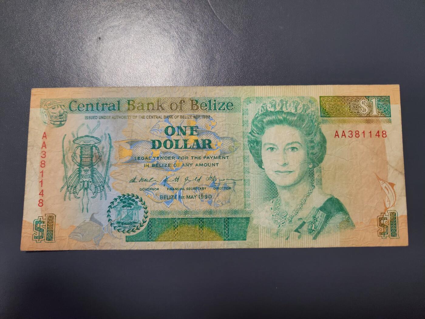 12月27号晚上8点 外国纸币自动截拍第77场 伯利兹1990年1元AA冠 首发 原票