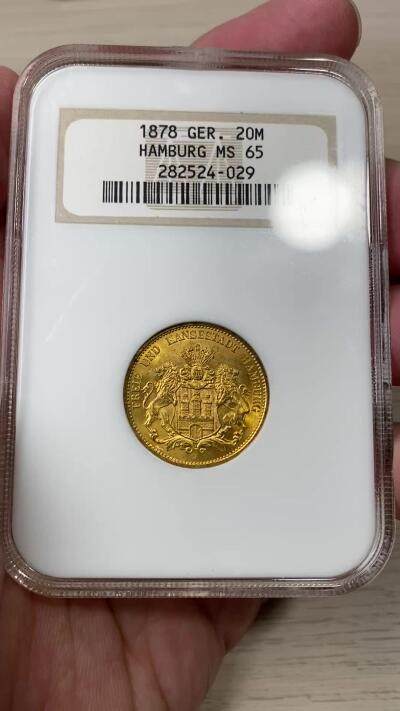 万国钱币拍卖第058期（万国新年大拍） NGC MS65 1878年德国汉堡自由市流通短翅20马克金币 经典汉堡自由市早期双狮短翅 无论光度还是底板都无可挑剔的近GEM品质  NGC老白盒典藏级 7.96g 900金