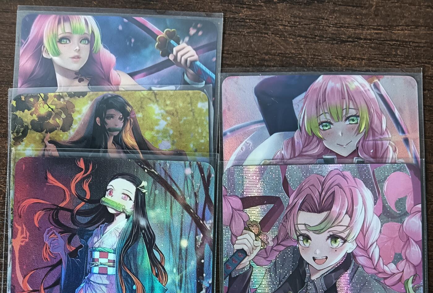 花开卡拍第53期（12月28号周日截拍，品控勿拍!!!拍品不寄存，运费5元，自制卡难免瑕疵，可能存在轻微撞角爆边等出厂瑕疵，品控介意勿拍！） 鬼灭之刃 甘露寺蜜璃3张+弥豆子2张 纱布闪、折光彩闪、粗闪