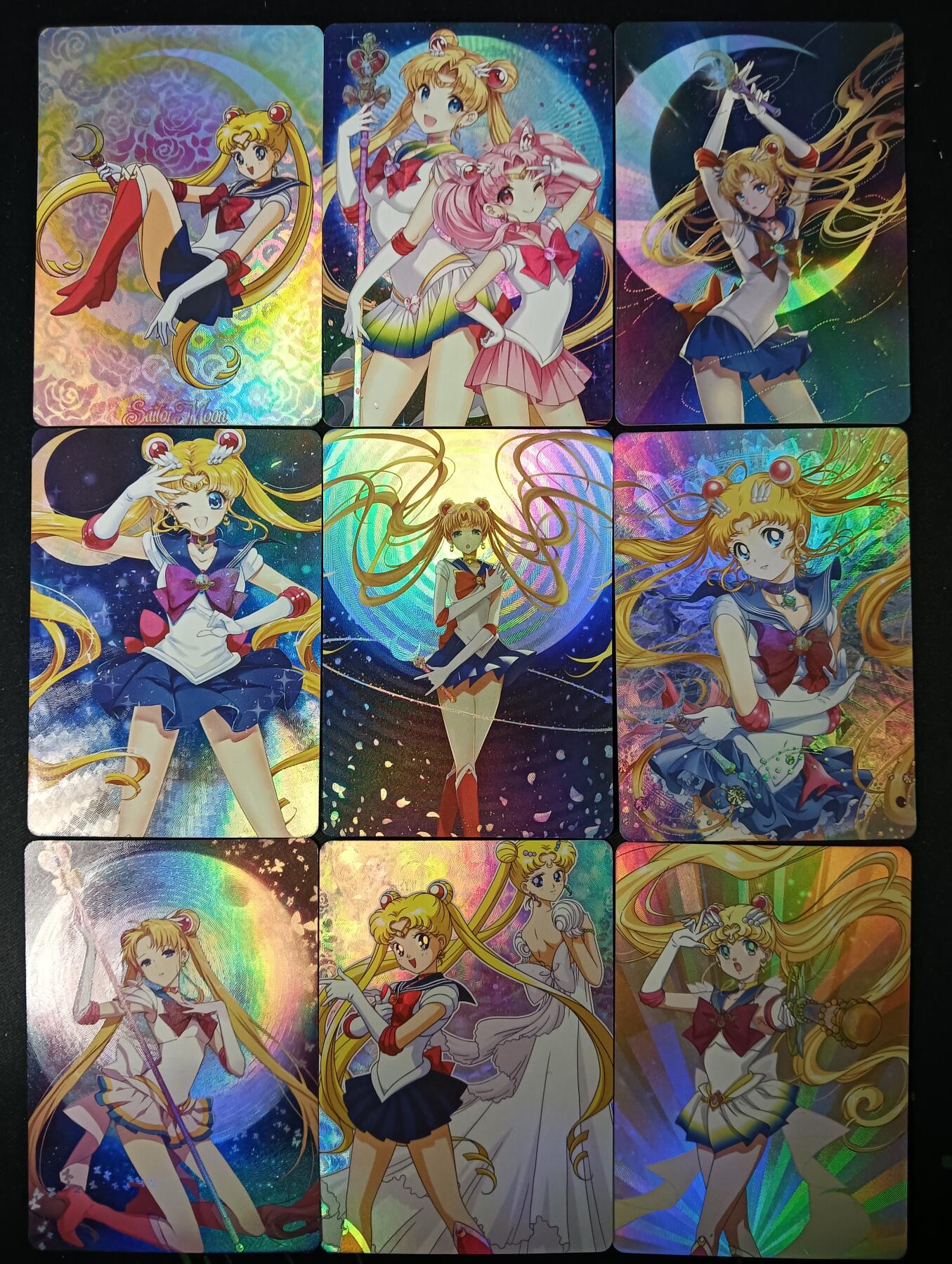 花开卡拍第53期（12月28号周日截拍，品控勿拍!!!拍品不寄存，运费5元，自制卡难免瑕疵，可能存在轻微撞角爆边等出厂瑕疵，品控介意勿拍！） 殿兔卡牌 美少女战士折光彩闪套9张