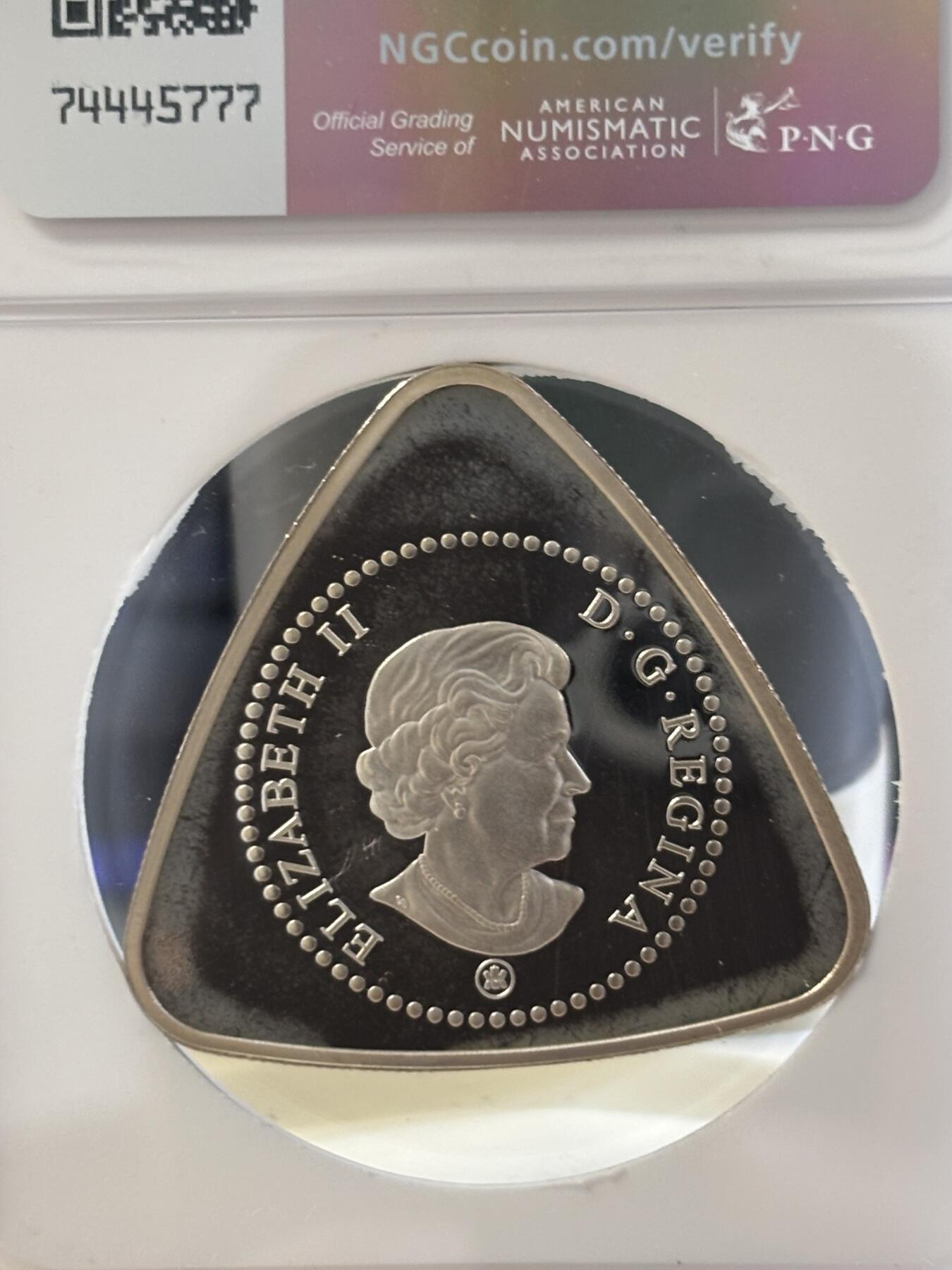 第186期拍卖 加拿大2008年牛奶支付代用币精制三角形纪念银币，20克