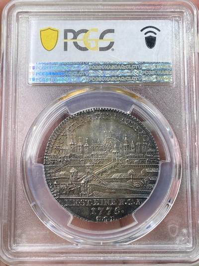 万国钱币拍卖第058期（万国新年大拍） PCGS MS63 1775德国雷根斯堡城市景观1/2泰勒 早期头像版 正面肖像为神罗皇帝约瑟夫二世 背面则是雷根斯堡老城景观 原味欧陆酱五彩 极其难得的品相状态 PC唯一冠军分