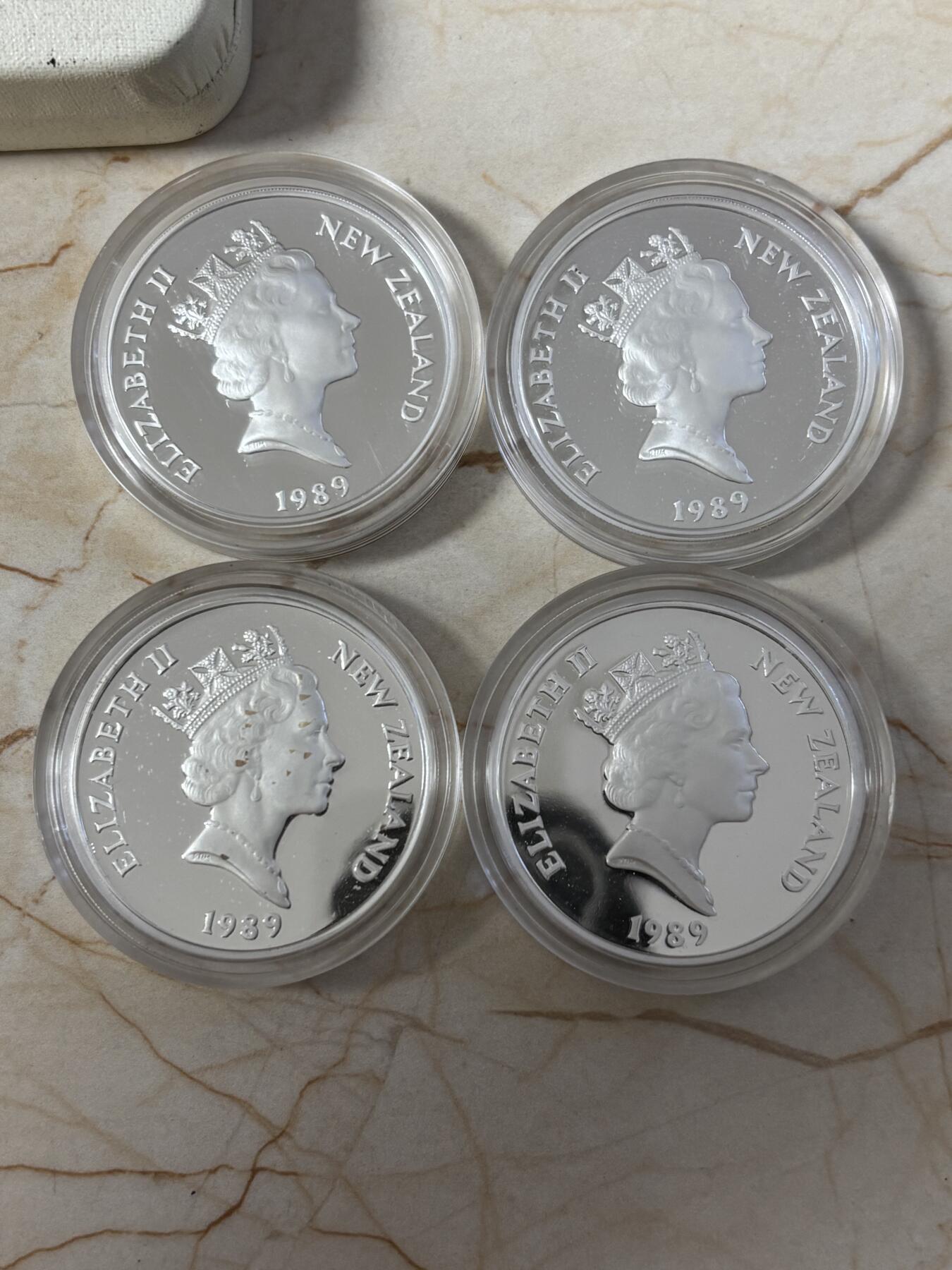 第186期拍卖 新西兰1989年英联邦运动会精制全新银币4枚，925银，27.216克*4，