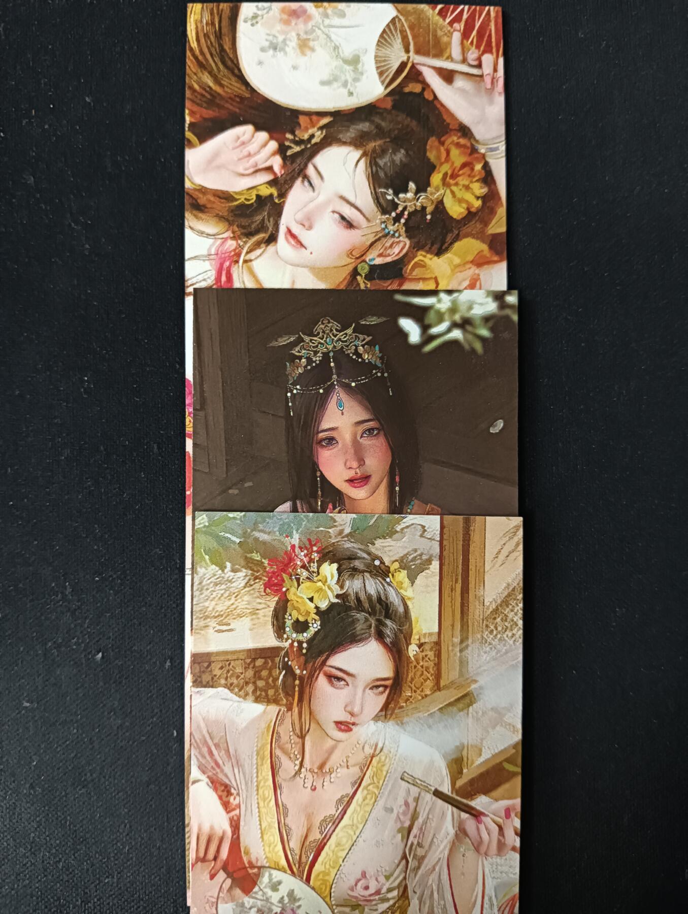 花开卡拍第53期（12月28号周日截拍，品控勿拍!!!拍品不寄存，运费5元，自制卡难免瑕疵，可能存在轻微撞角爆边等出厂瑕疵，品控介意勿拍！） 燎原 妖姬传 书签3张 普卡，其中聘娘有压痕见第二张图，介意勿拍