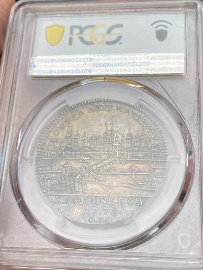 万国钱币拍卖第058期（万国新年大拍） PCGS MS63 1775德国雷根斯堡城市景观1/2泰勒 早期头像版 正面肖像为神罗皇帝约瑟夫二世 背面则是雷根斯堡老城景观 原味欧陆酱五彩 极其难得的品相状态 PC唯一冠军分