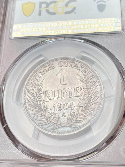 万国钱币拍卖第058期（万国新年大拍） PCGS MS64 1904年德国德属东非威廉二世军装1卢比银币 德属热门品种 丝绸转光幻彩包浆极美收藏级 PC亚军分更高仅一枚