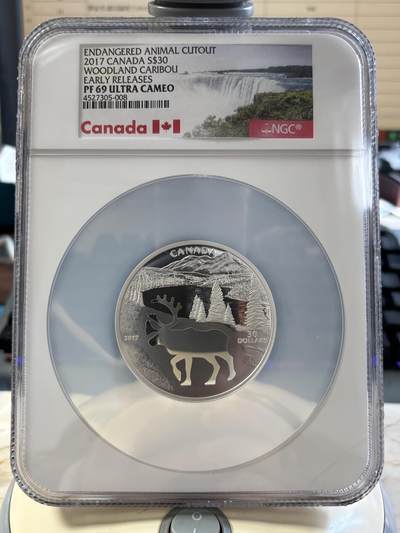 第186期拍卖 - 少见品种重量近2盎司加拿大2017年镂空剪影北美驯鹿NGC评级彩色早期标签69分精制银币9999银重52.88克直径54毫米