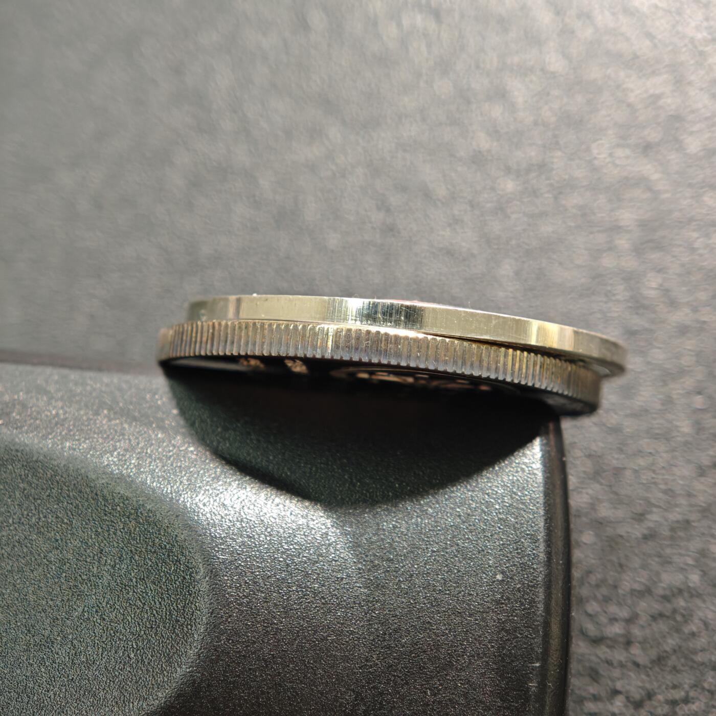 【德藏】世界币章拍卖第159期(元旦专场拍卖) 2枚一组 F1车手舒马赫纪念银章 辛亥革命90周年纪念银章  直径约：29.8mm/辛亥革命章,30mm/舒马赫章；重约：10g/辛亥革命章,9.6g/舒马赫章