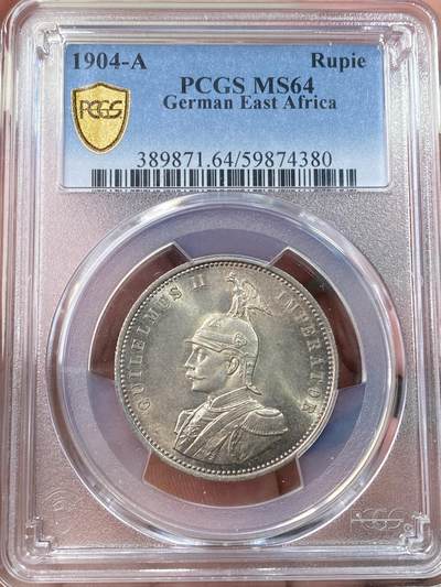万国钱币拍卖第058期（万国新年大拍） - PCGS MS64 1904年德国德属东非威廉二世军装1卢比银币 德属热门品种 丝绸转光幻彩包浆极美收藏级 PC亚军分更高仅一枚