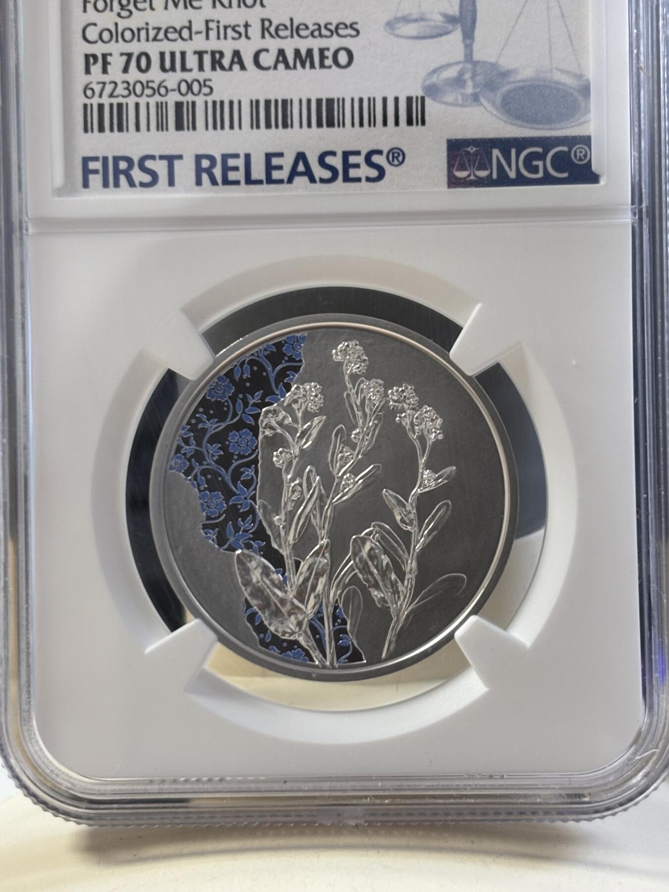 第186期拍卖 盒证齐全奥地利2023年花语系列勿忘我NGC评级首期蓝标70分彩色精制纪念银币