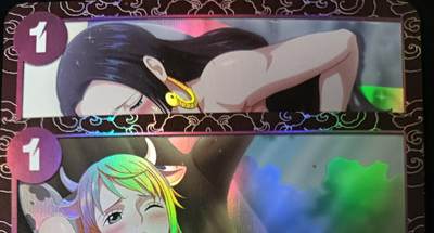 花开卡拍第53期（12月28号周日截拍，品控勿拍!!!拍品不寄存，运费5元，自制卡难免瑕疵，可能存在轻微撞角爆边等出厂瑕疵，品控介意勿拍！） - 大熊卡牌 艺术卡 海贼王百合彩闪2张，一张有出厂细微黑线