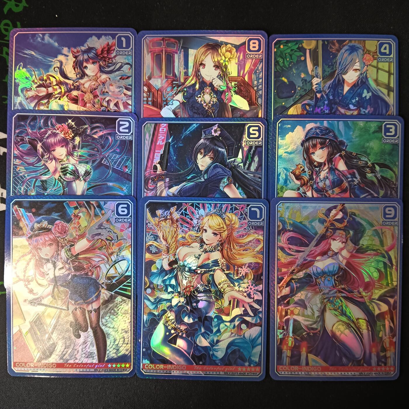 花开卡拍第53期（12月28号周日截拍，品控勿拍!!!拍品不寄存，运费5元，自制卡难免瑕疵，可能存在轻微撞角爆边等出厂瑕疵，品控介意勿拍！） 驴歪歪 斑斓少女蓝色系列 彩闪9张