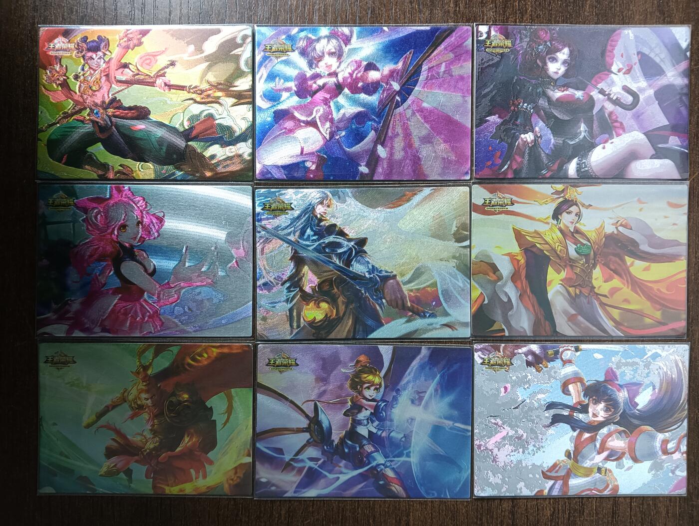 花开卡拍第53期（12月28号周日截拍，品控勿拍!!!拍品不寄存，运费5元，自制卡难免瑕疵，可能存在轻微撞角爆边等出厂瑕疵，品控介意勿拍！） 王者荣耀 经典皮肤第三辑 一套9张 粗闪，有张轻微撞角