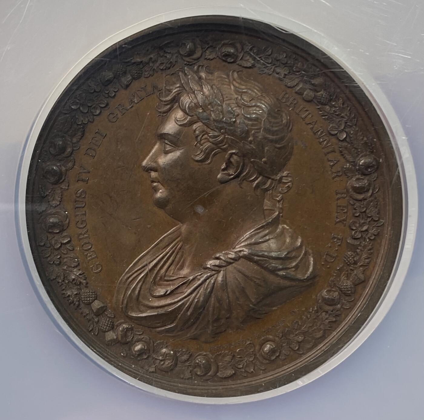 万国钱币拍卖第058期（万国新年大拍） NGC MS63 1821年英国乔治四世克承大统加冕为大不列颠及爱尔兰联合王国及汉诺威国王纪念大铜章 少见巨型大规格版式 高浮雕不列颠三女神为乔四献上桂冠 NGC老盒难得