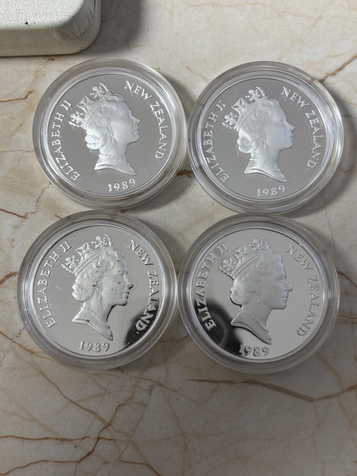 第186期拍卖 新西兰1989年英联邦运动会精制全新银币4枚，925银，27.216克*4，
