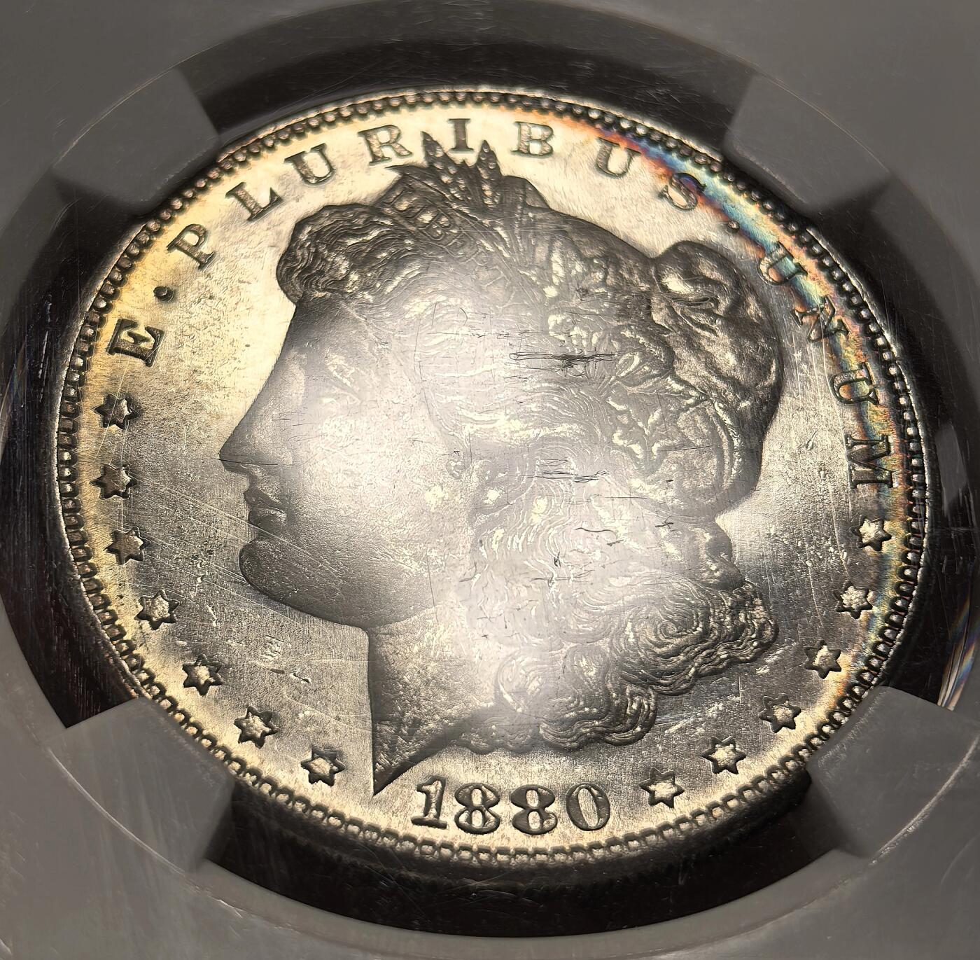博洋堂世界钱币拍卖第154期（全场包邮） NGC MS65PL 美国1880年S版摩根$1银币 币面双面图案凝霜质感与底板形成强烈视觉反差 类镜面高分状态下仍留存绝美月牙五彩包浆实属难得 老盒品质保障 麦稀奇近期热涨品种