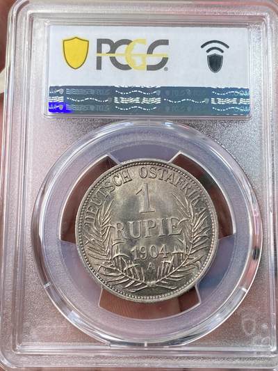万国钱币拍卖第058期（万国新年大拍） PCGS MS64 1904年德国德属东非威廉二世军装1卢比银币 德属热门品种 丝绸转光幻彩包浆极美收藏级 PC亚军分更高仅一枚