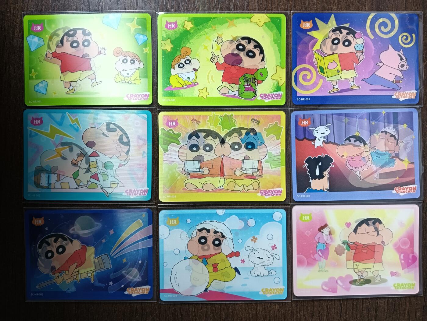 花开卡拍第53期（12月28号周日截拍，品控勿拍!!!拍品不寄存，运费5元，自制卡难免瑕疵，可能存在轻微撞角爆边等出厂瑕疵，品控介意勿拍！） 蜡笔小新卡牌 光栅变换卡共9张 编号1-9 