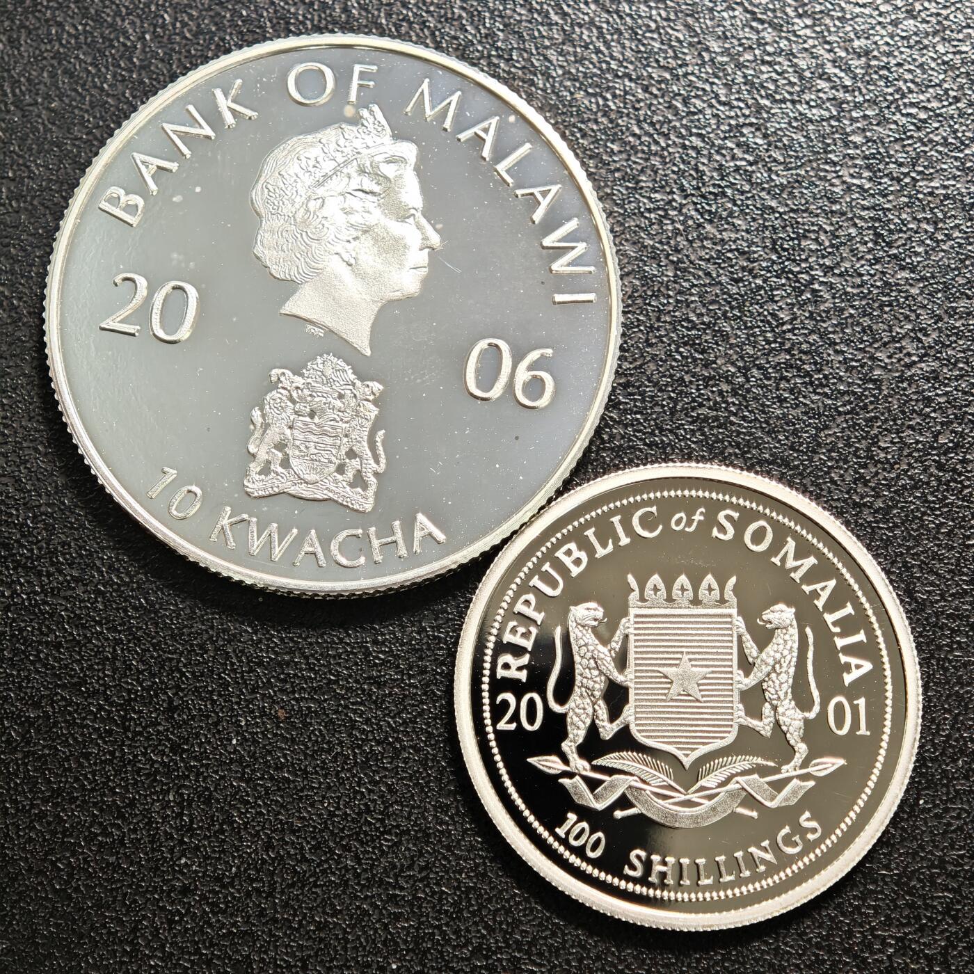 【德藏】世界币章拍卖第159期(元旦专场拍卖) 2枚一组 2006年 马拉维2008北京奥运会10克瓦查彩色纪念币 2001年 索马里2006德国世界杯100先令彩色纪念币 品相极佳