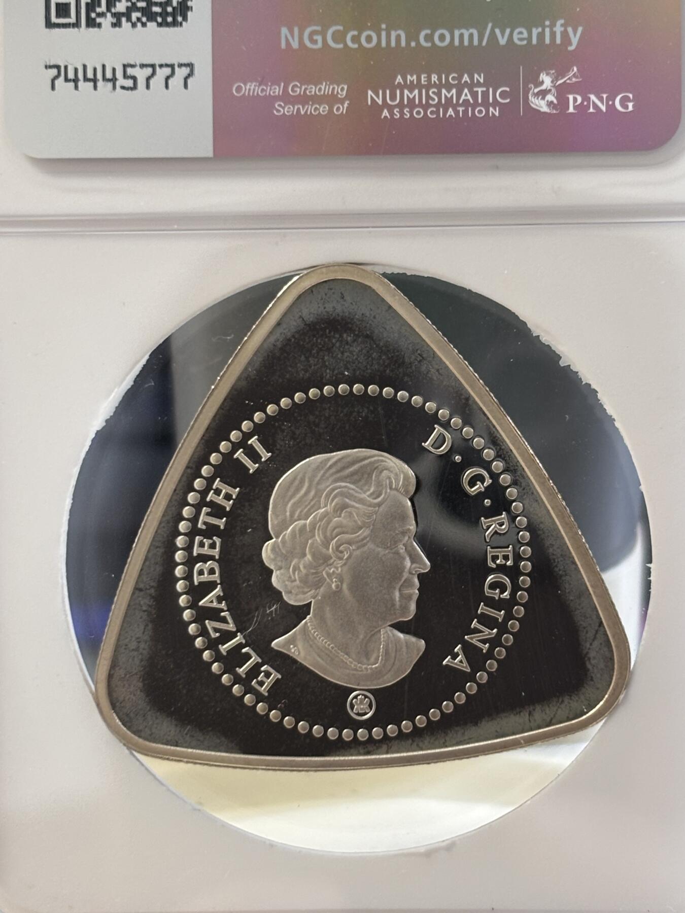 第186期拍卖 加拿大2008年牛奶支付代用币精制三角形纪念银币，20克