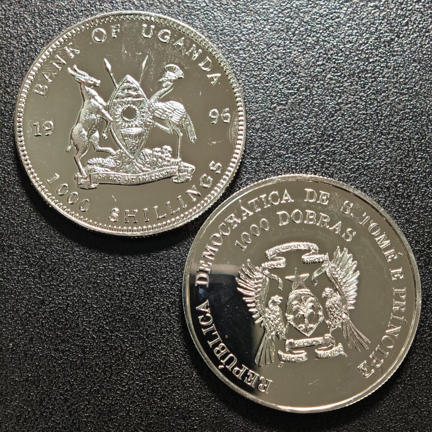 【德藏】世界币章拍卖第159期(元旦专场拍卖) 2枚一组 1996年 乌干达、圣多美和普林西比亚特兰大奥运会纪念镍币 品相极佳