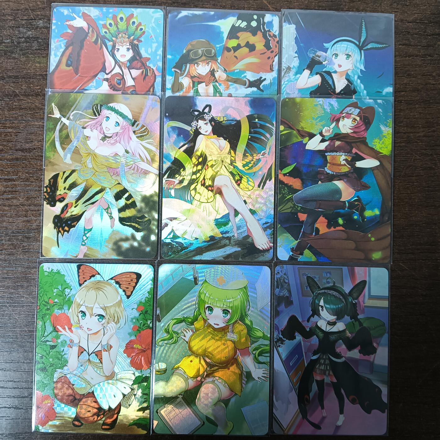 花开卡拍第53期（12月28号周日截拍，品控勿拍!!!拍品不寄存，运费5元，自制卡难免瑕疵，可能存在轻微撞角爆边等出厂瑕疵，品控介意勿拍！） 猴子动漫 蝴蝶少女 一套9张 九种不同种类蝴蝶幻化成少女 折光彩闪