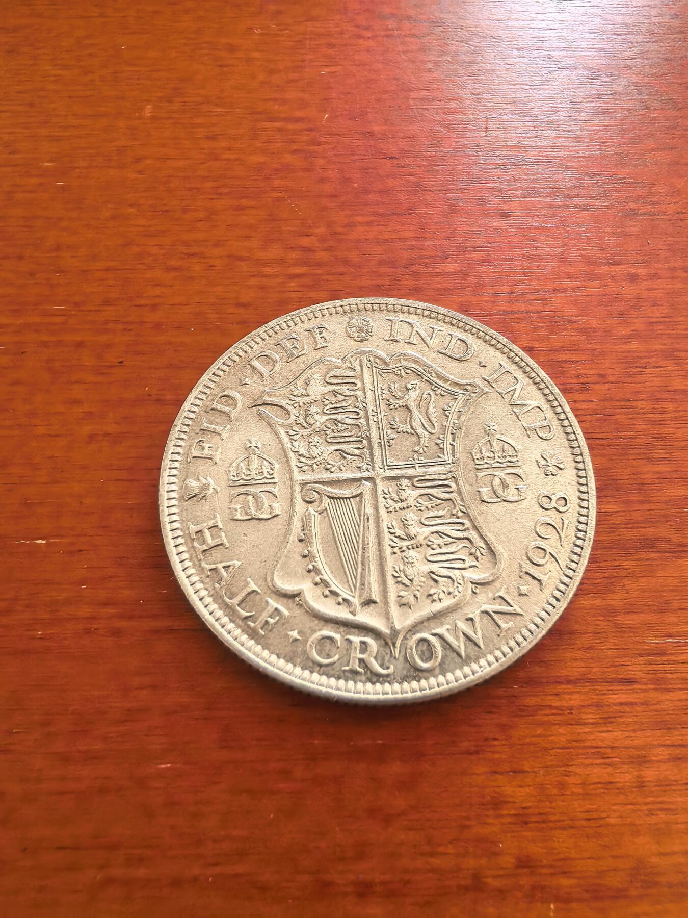 长老汇蛇年精选第八十八场拍卖 1928英国乔治五世1/2克朗银币，14.14克500银，克书60分45美金