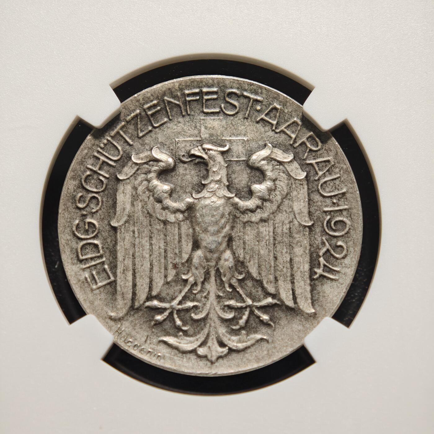 【德藏】世界币章拍卖第159期(元旦专场拍卖) 1924年 瑞士阿尔高州阿劳射击节银章 磨砂质感 鹰徽细腻 整体包浆搭配图案映衬出十足朦胧感 NGC MS64