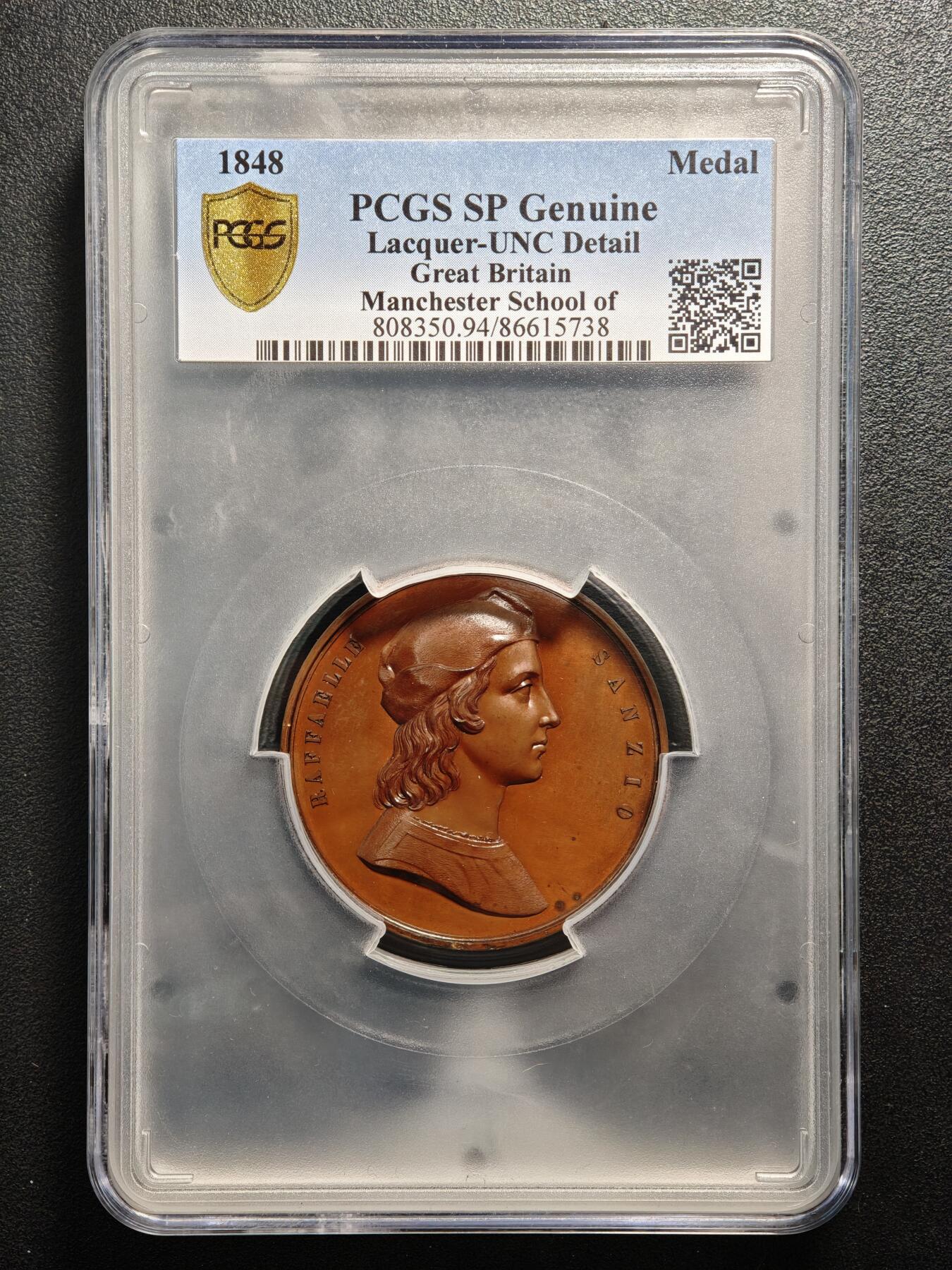 【德藏】世界币章拍卖第159期(元旦专场拍卖) 1848年 英国曼彻斯特设计学院铜奖章，直径50毫米，发行量260枚，PCGS UNC 正面是文艺复兴三杰之一的拉斐尔头戴帽、留长发的右侧面半身像，背面是三位古典人物雕像-天使和女神的形象。雕刻精美，是雕刻大师威廉·怀恩（W.Wyon.R.A）的精心之作，超高浮雕，特别精制版，巧克力包浆，醇厚光泽，稀有品种