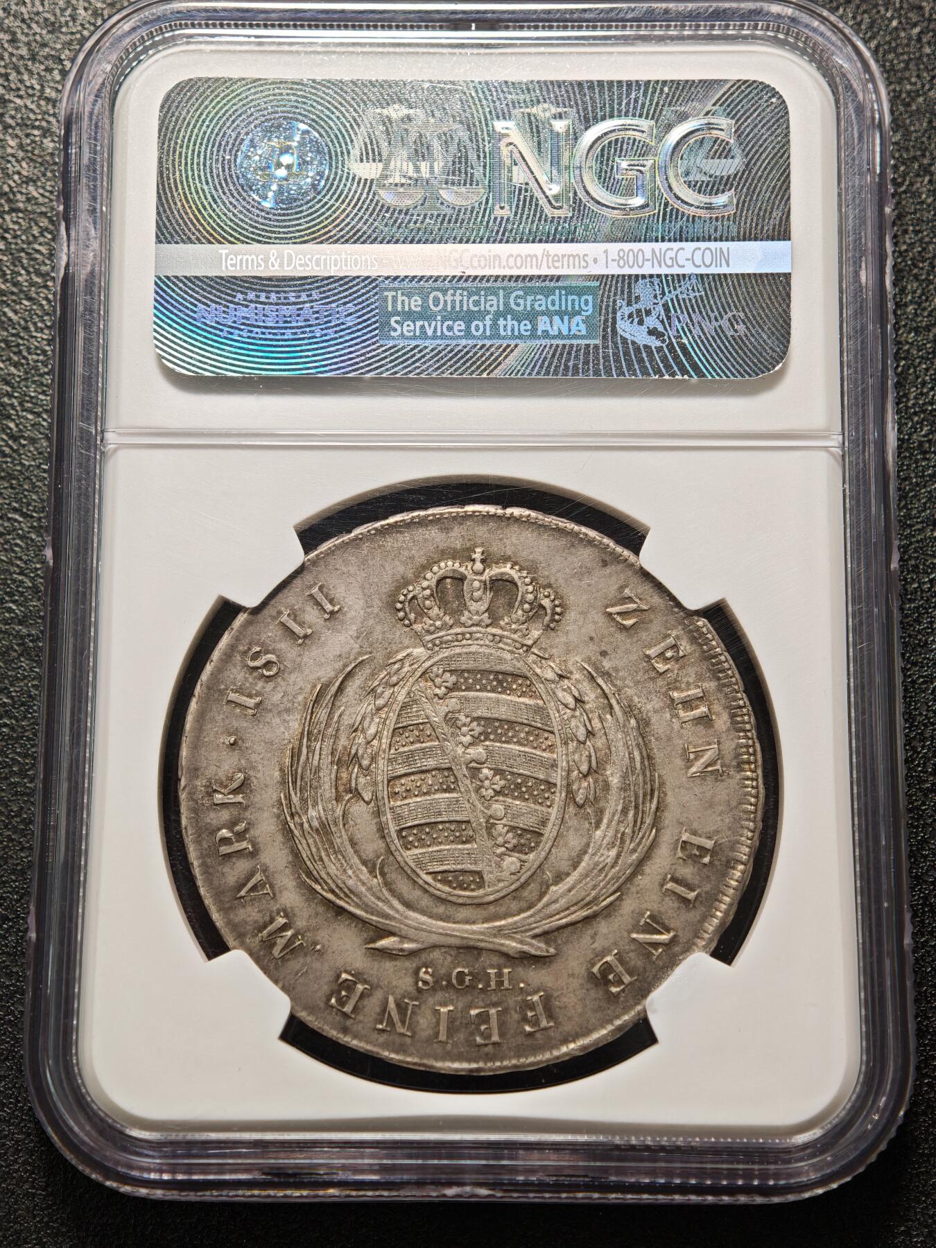 【德藏】世界币章拍卖第159期(元旦专场拍卖) 1811年 德国萨克森奥古斯特泰勒银币 NGC AU55 正面是萨克森国王弗里德里希·奥古斯特一世戎装右侧面肖像，背面是萨克森盾徽。原味五彩包浆，减重痕明显，珍惜品种，值得收藏！