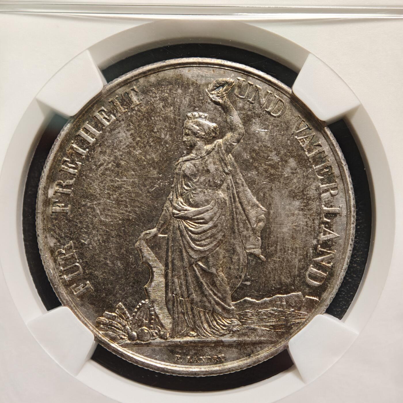 【德藏】世界币章拍卖第159期(元旦专场拍卖) 1872年 瑞士苏黎世射击节5法郎大银币，发行量仅1万枚 NGC MS61 正面是瑞士自由女神一手高举桂冠、一手扶着盾牌的站立像，背面是瑞士盾牌和射击节徽章，雕刻精美，保存状态良好，五彩包浆，稀少品种，NGC低评