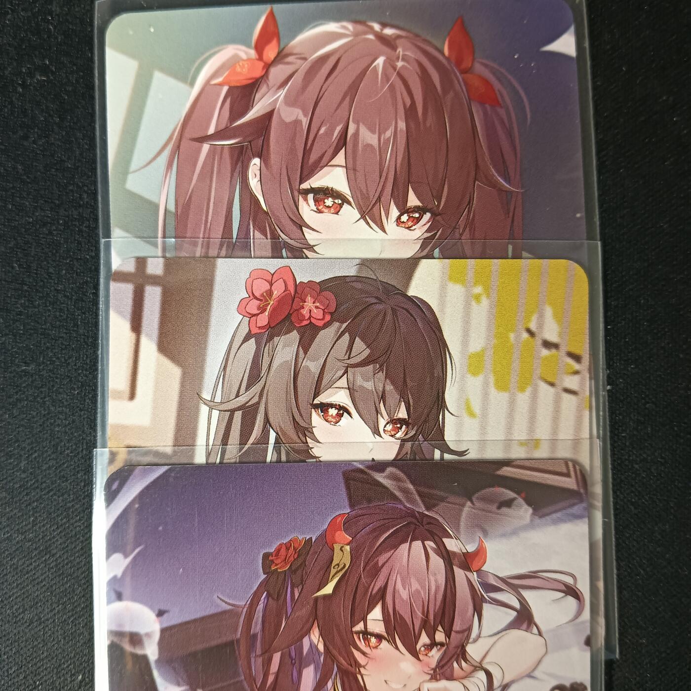 花开卡拍第53期（12月28号周日截拍，品控勿拍!!!拍品不寄存，运费5元，自制卡难免瑕疵，可能存在轻微撞角爆边等出厂瑕疵，品控介意勿拍！） 原神 胡桃 1套3张 普卡