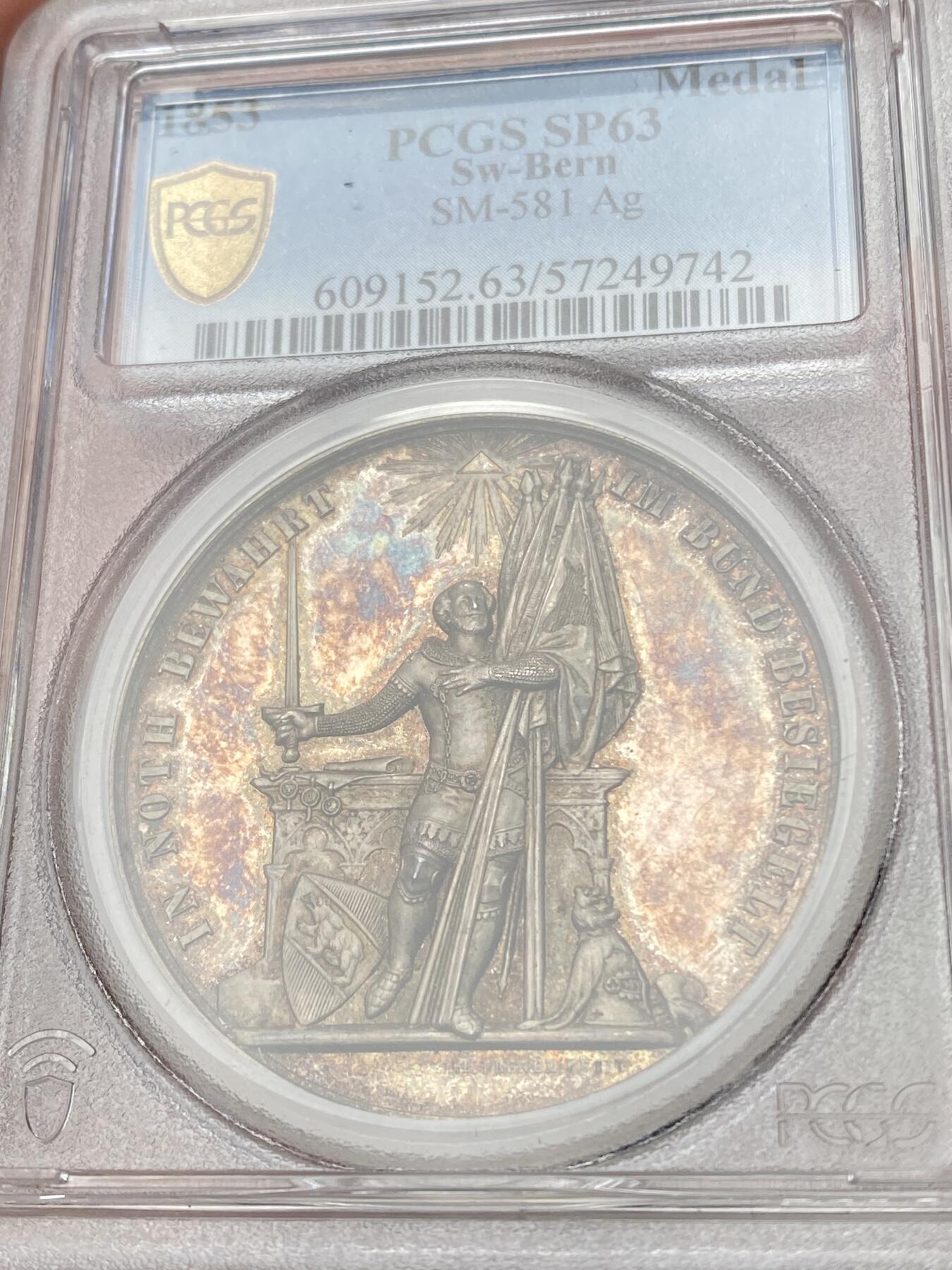 万国钱币拍卖第058期（万国新年大拍） PCGS SP63 1853年瑞士伯尔尼加入瑞士联邦500周年纪念大银章 瑞士联邦高浮雕罕见品种 代表伯尔尼的骑士手持七盟气质宣誓效忠 喷砂质感精铸镜面晚霞彩包浆极美收藏级 41MM 35G
