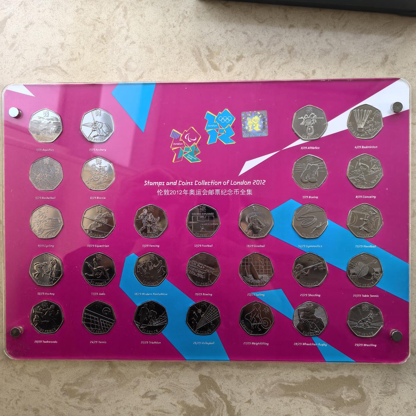 道一币馆币章第一百六十场 盒证 英国伦敦2012年30枚奥运会邮票、10枚纪念徽章，29枚59便士纪念币大全套 底部有点脱胶