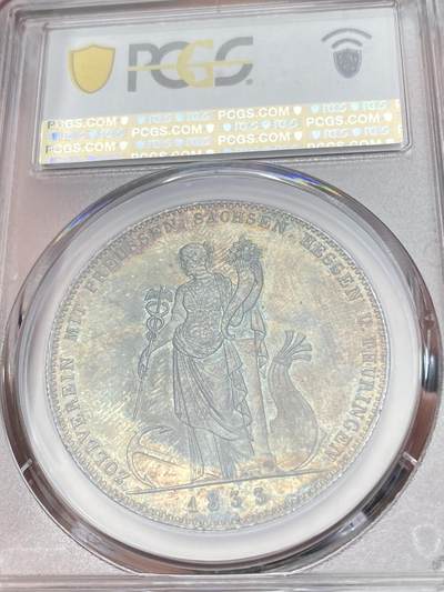 万国钱币拍卖第058期（万国新年大拍） PCGS MS64 1833巴伐利亚路德维希一世关税同盟历史大泰勒 在历史泰勒四枚关税同盟系列中好品最为罕见的品种 人格化的巴伐利亚女神着一席长袍 左手举丰饶角 右手持墨丘利权杖 寓意新的关税同盟带来贸易与财富 双面厚重油画五彩 顶级典藏品质