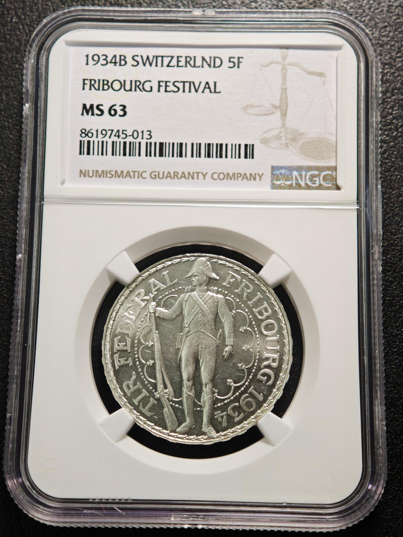 【德藏】世界币章拍卖第159期(元旦专场拍卖) 1934年 瑞士弗里堡州联邦射击节5法郎纪念银币 NGC MS63 原光犀利 1934年弗里堡射击节银币发行于二战前夕，因时代背景特殊且发行量有限，是瑞士射击节纪念币中的热门品类
