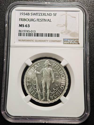 【德藏】世界币章拍卖第159期(元旦专场拍卖) - 1934年 瑞士弗里堡州联邦射击节5法郎纪念银币 NGC MS63 原光犀利 1934年弗里堡射击节银币发行于二战前夕，因时代背景特殊且发行量有限，是瑞士射击节纪念币中的热门品类