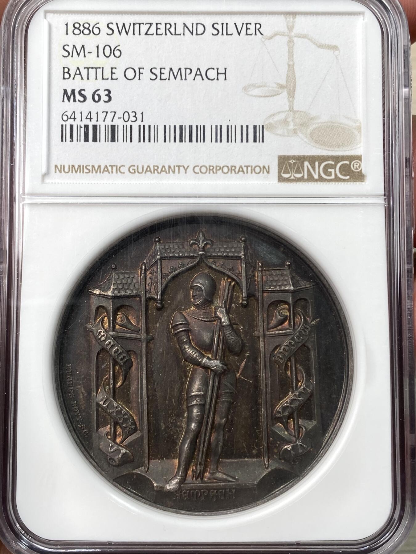 万国钱币拍卖第058期（万国新年大拍） NGC MS63 1886年瑞士萨姆帕奇战役纪念大银章 原味五彩高浮雕 NGC加厚盒 火烧云般的醇厚紫红葡萄酒包浆极其诱人