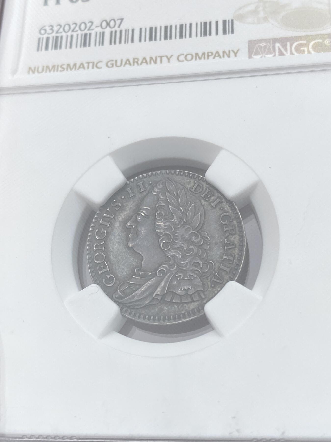 万国钱币拍卖第058期（万国新年大拍） NGC PF65 1746年英国乔治二世精制6便士银币 出自英国历史上第一次公开发行的精制套币 发行量仅有令人咋舌的100套 与普制完全不同的工艺与观感 均匀英式乌云包浆 附带6枚出售及拍卖标签 流传有序