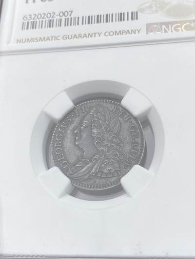万国钱币拍卖第058期（万国新年大拍） NGC PF65 1746年英国乔治二世精制6便士银币 出自英国历史上第一次公开发行的精制套币 发行量仅有令人咋舌的100套 与普制完全不同的工艺与观感 均匀英式乌云包浆 附带6枚出售及拍卖标签 流传有序