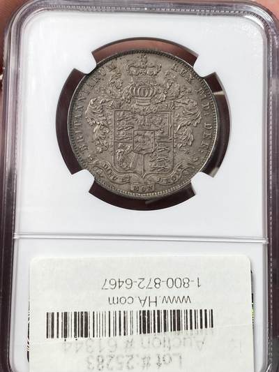 万国钱币拍卖第058期（万国新年大拍） NGC MS64 1825年英国乔治四世半克朗银币 与1826精制克朗相同的设计 依旧华丽的摄政风格 64级别已是相当难得的存在 丝绸般的底板在紫罗兰渐变五彩的加持下令人赏心悦目 不容错过的顶级收藏品质