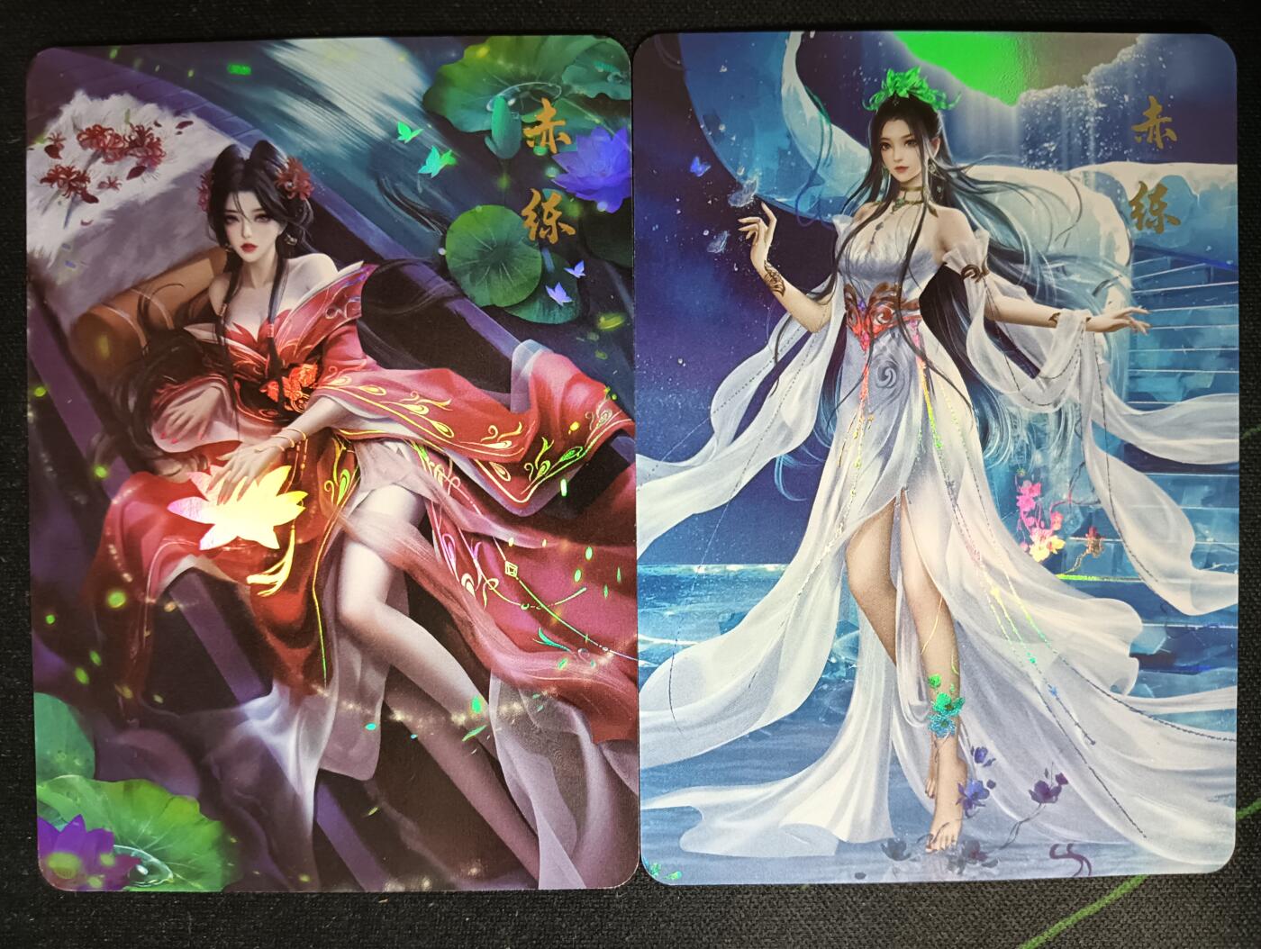 花开卡拍第53期（12月28号周日截拍，品控勿拍!!!拍品不寄存，运费5元，自制卡难免瑕疵，可能存在轻微撞角爆边等出厂瑕疵，品控介意勿拍！） 秦时明月 赤练 1套2张 彩闪