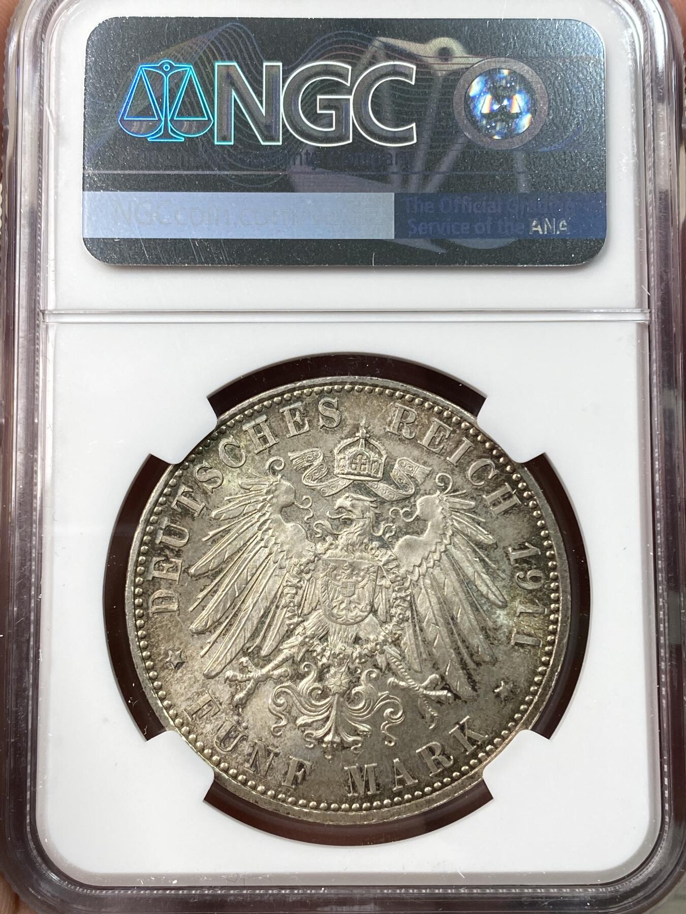 万国钱币拍卖第058期（万国新年大拍） NGC MS65 1911巴伐利亚利奥波德九十大寿纪念5马克 原味五彩BU转光 无可挑剔的品质状态