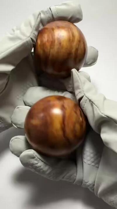 零元拍：  海南黄花梨大手球一对，尺寸：50MM