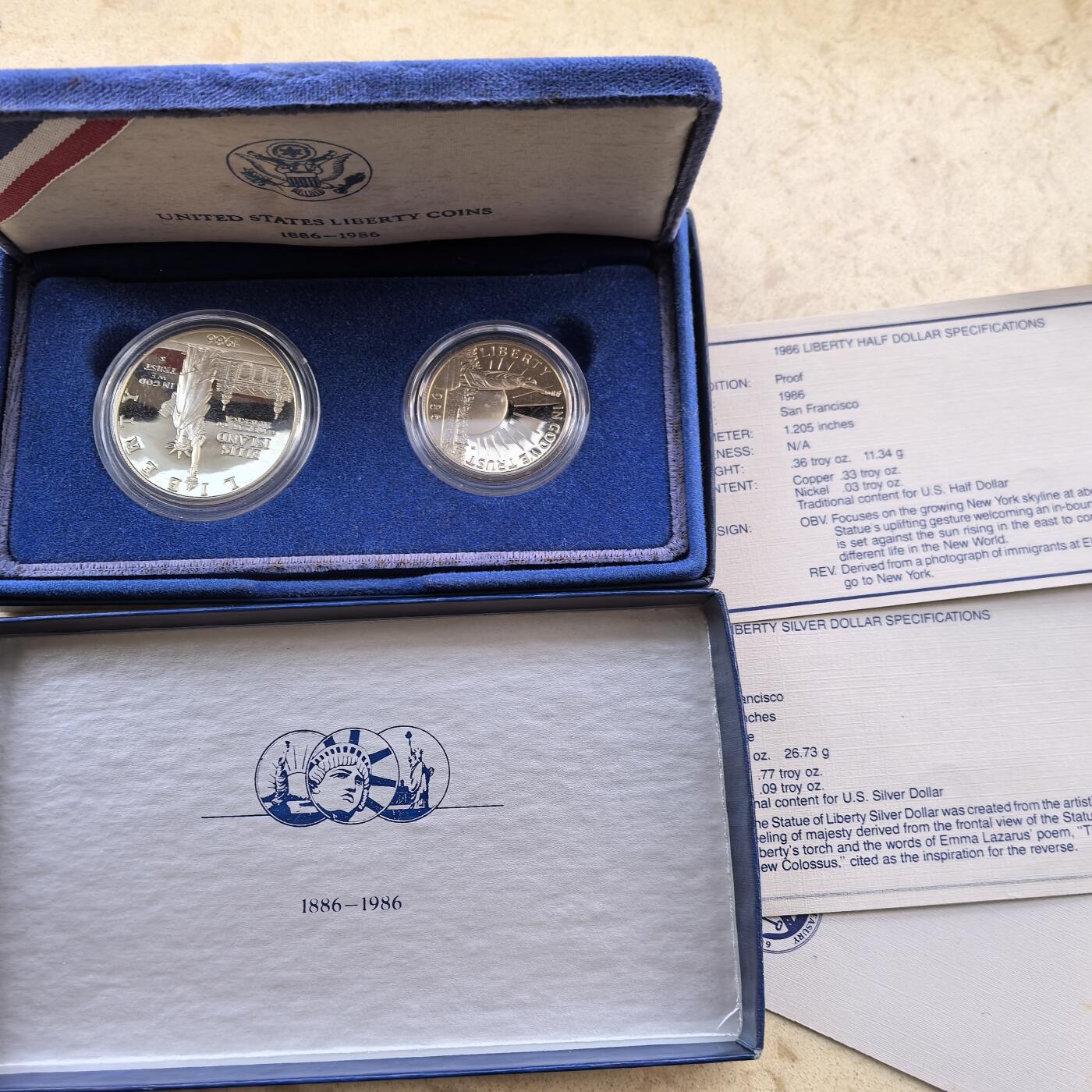 道一币馆币章第一百六十场 原盒证 美国1986年自由女神像落成200周年精制纪念套币两枚 1元银币+50分镍币