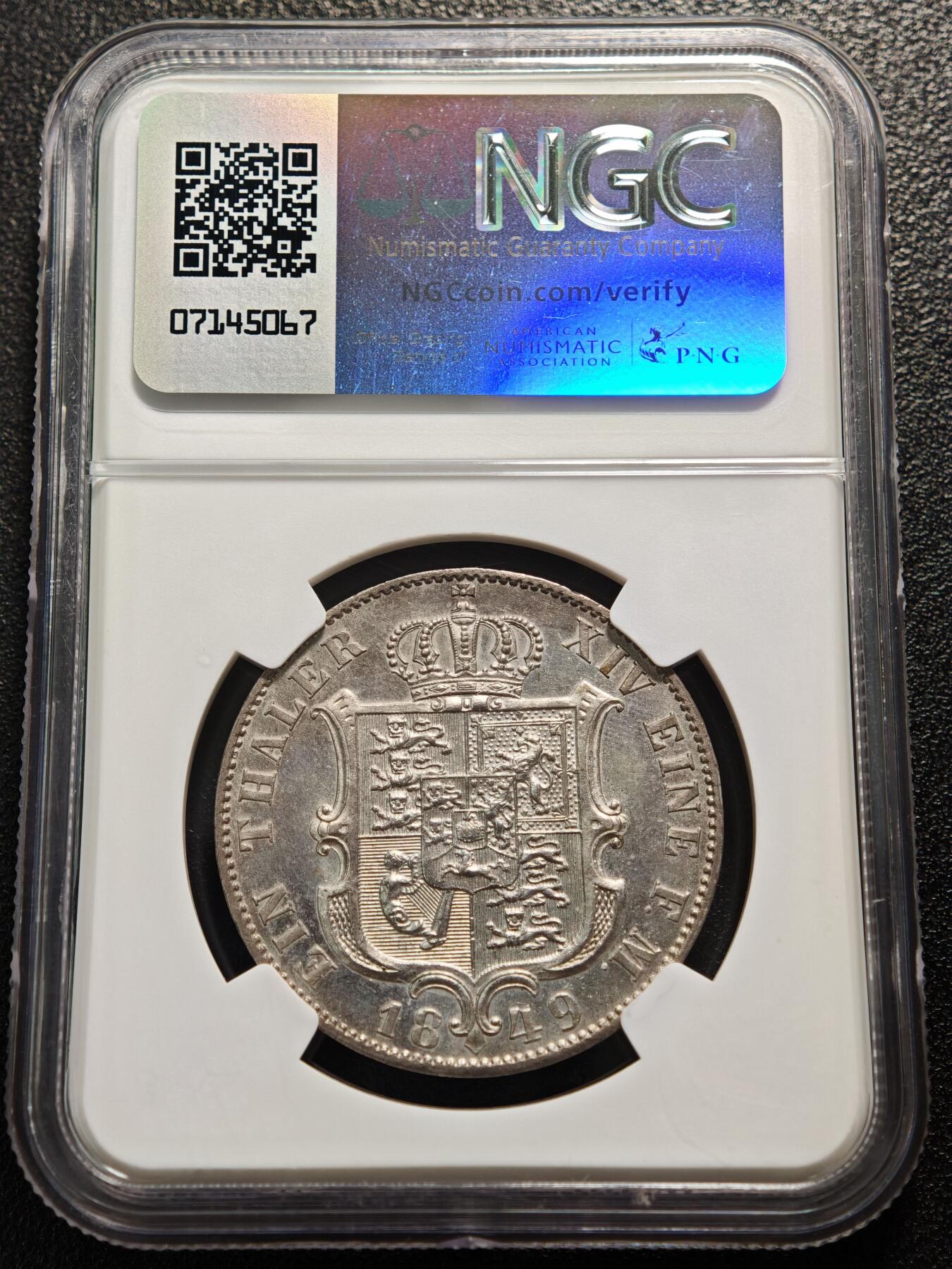 【德藏】世界币章拍卖第159期(元旦专场拍卖) 1849年 德国汉诺威恩斯特·奥古斯特泰勒银币 NGC MS61 淡包浆 状态十足 背面汉诺威王国的纹章（带有皇冠的盾徽），盾徽融合了汉诺威、大不列颠等多地的徽章元素，体现了汉诺威与英国的王室亲缘关系（恩斯特·奥古斯特是英国乔治三世的儿子）